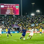 Live football betting interface showing in-play World Cup match odds and statistics